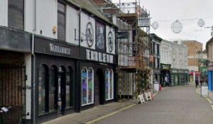 22-year-old jumped on nightclub bouncer’s car and kneed police officer’s eye