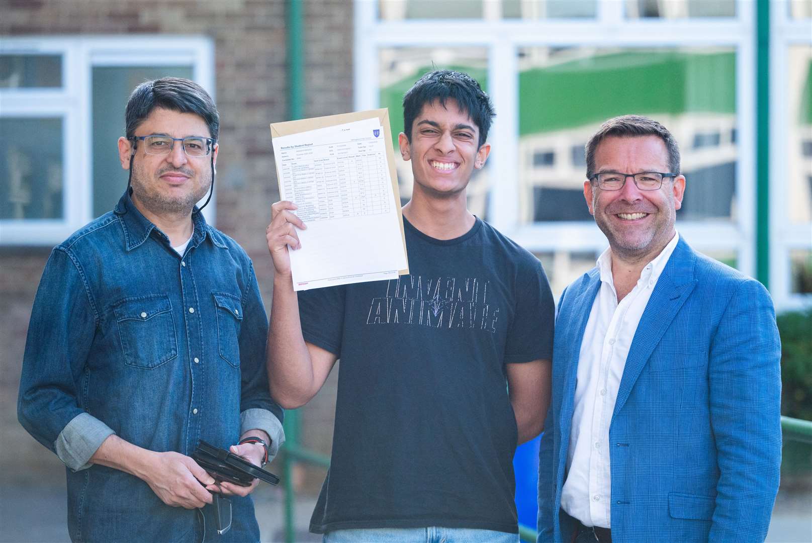 Ashhad Naqavi with Andy Johnson, executive head teacher of Springwood High. Picture: Ian Burt