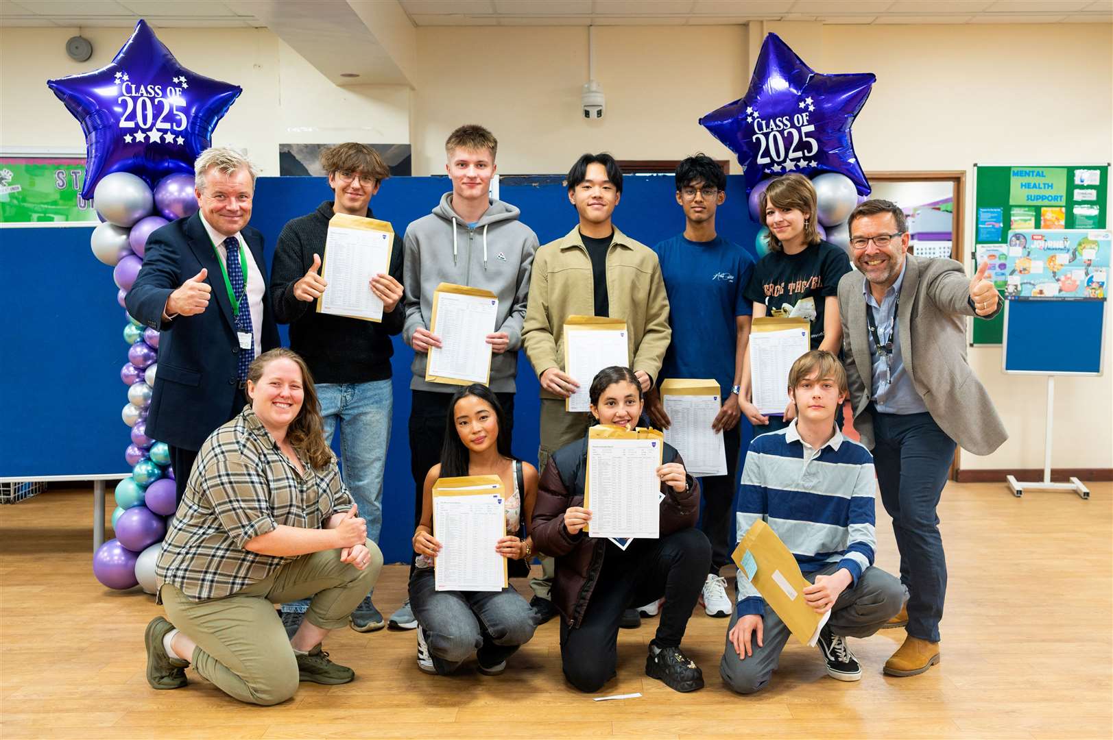 Students gathered this morning to collect their GCSE results from Springwood. Picture: Ian Burt