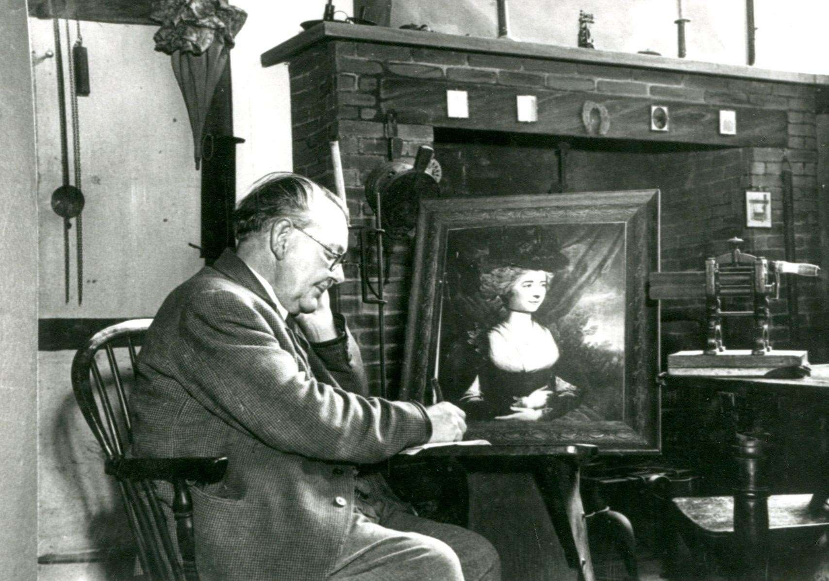 Herbert E. Bocking with a portrait of writer Fanny Burney. Picture: Lynn Museum