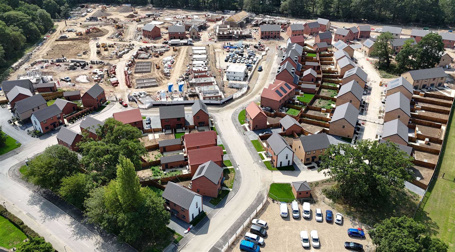 Parts of Florence Fields are complete and occupied, while other homes are nearing completion - and further into the site, works are at an early stage. Picture: West Norfolk Council