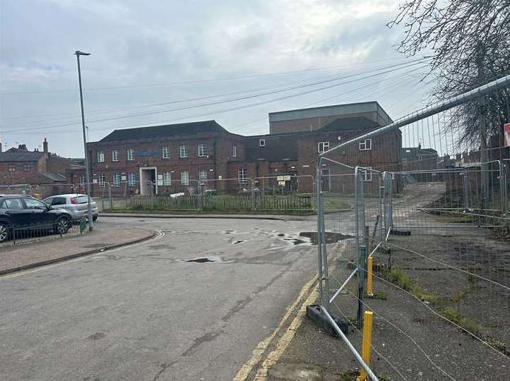 The Providence Street community centre remains cordoned off. Picture: Kris Johnston
