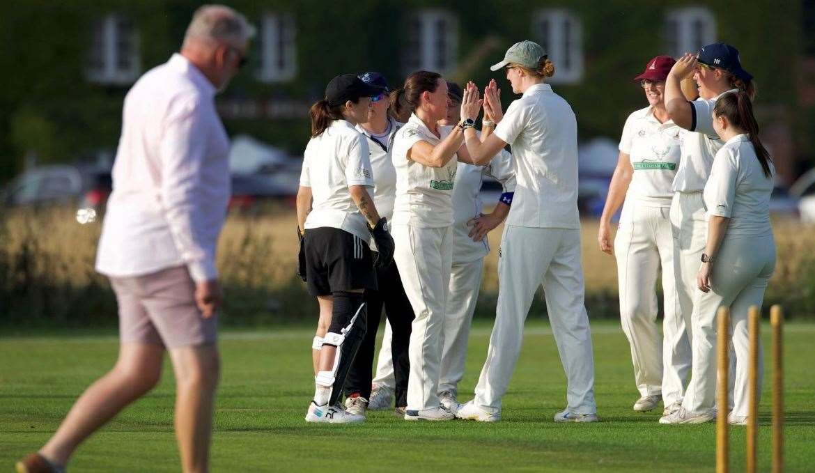 High fives in the field.
