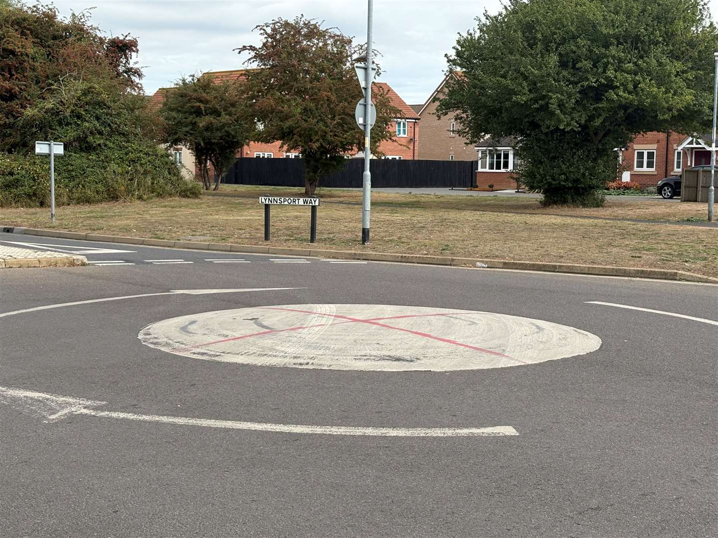 A red cross has been spray-painted on the roundabout by Lynnsport Way and Reid Way. Picture: Lucy Carter
