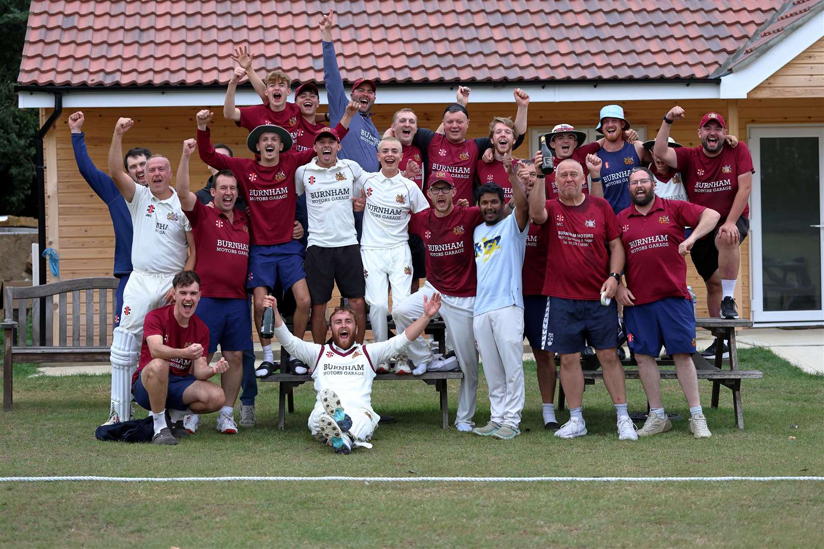 Players from Fakenham 2nds and 3rds celebrate their promotions together. Picture: Ronnie Heyhoe
