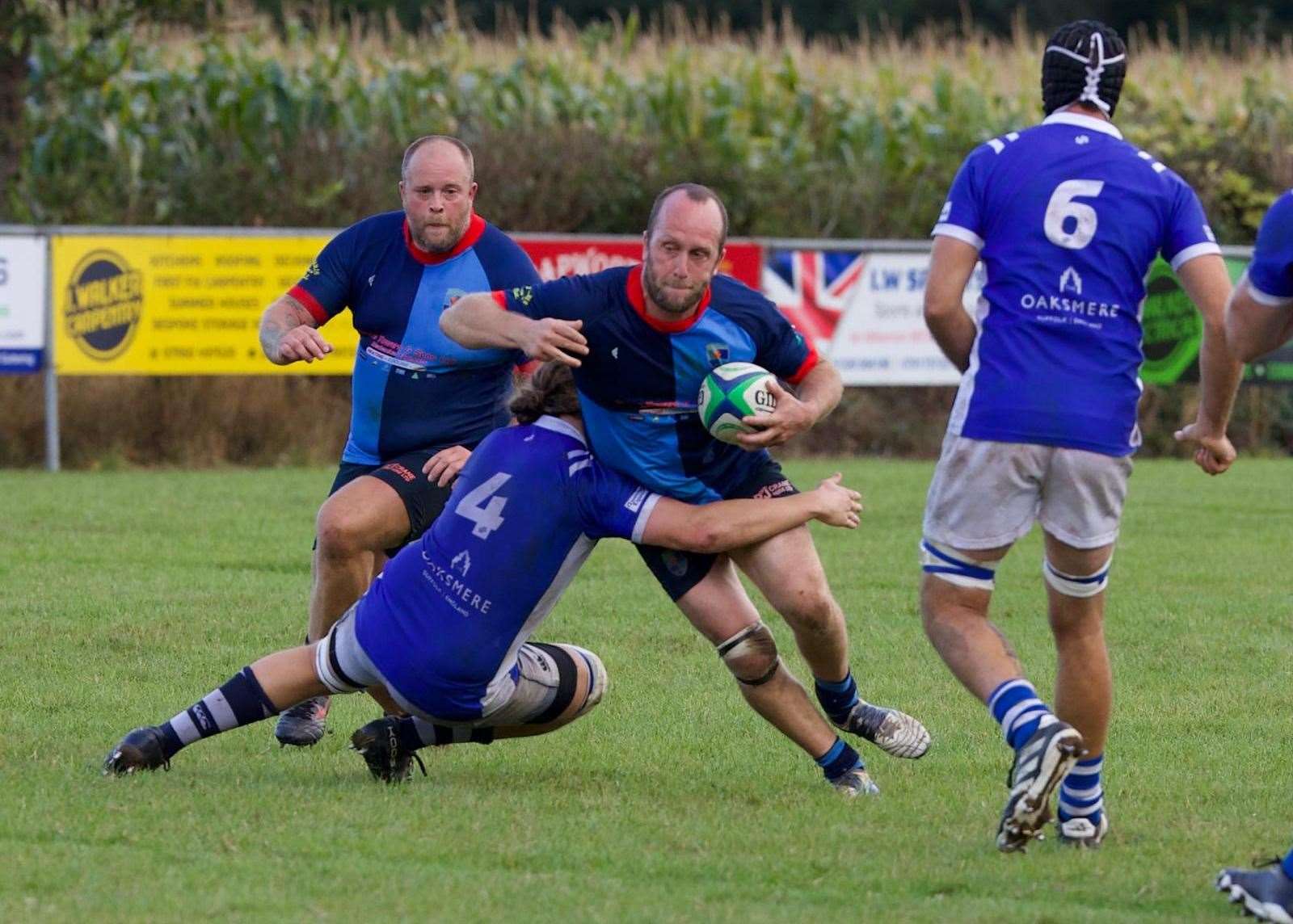 Fakenham loosehead Matt King carrying, with support from second row Martin Tagg. Picture: James Peeling