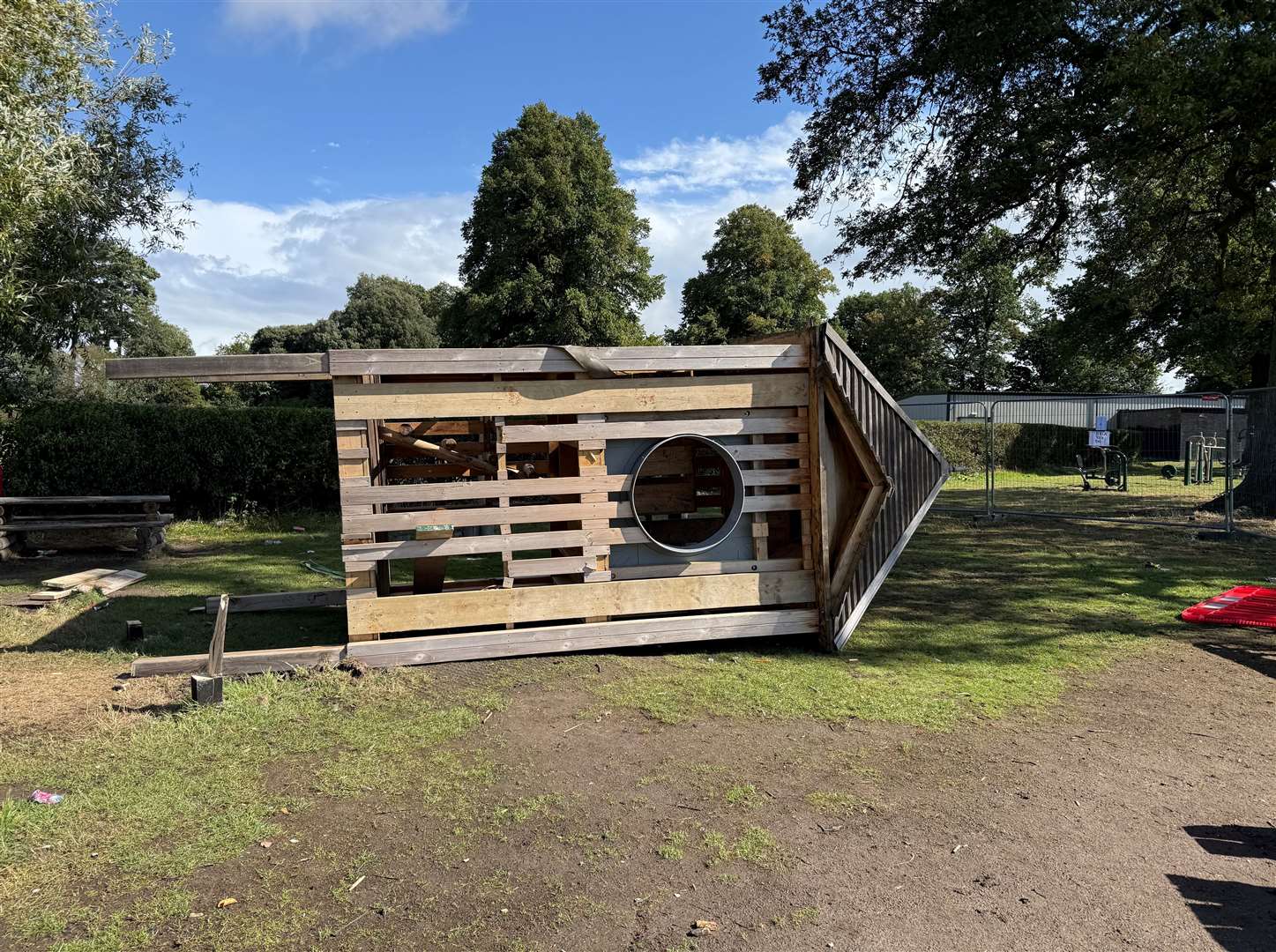 The Gaywood park clock tower on its side, before being removed due to vandalism