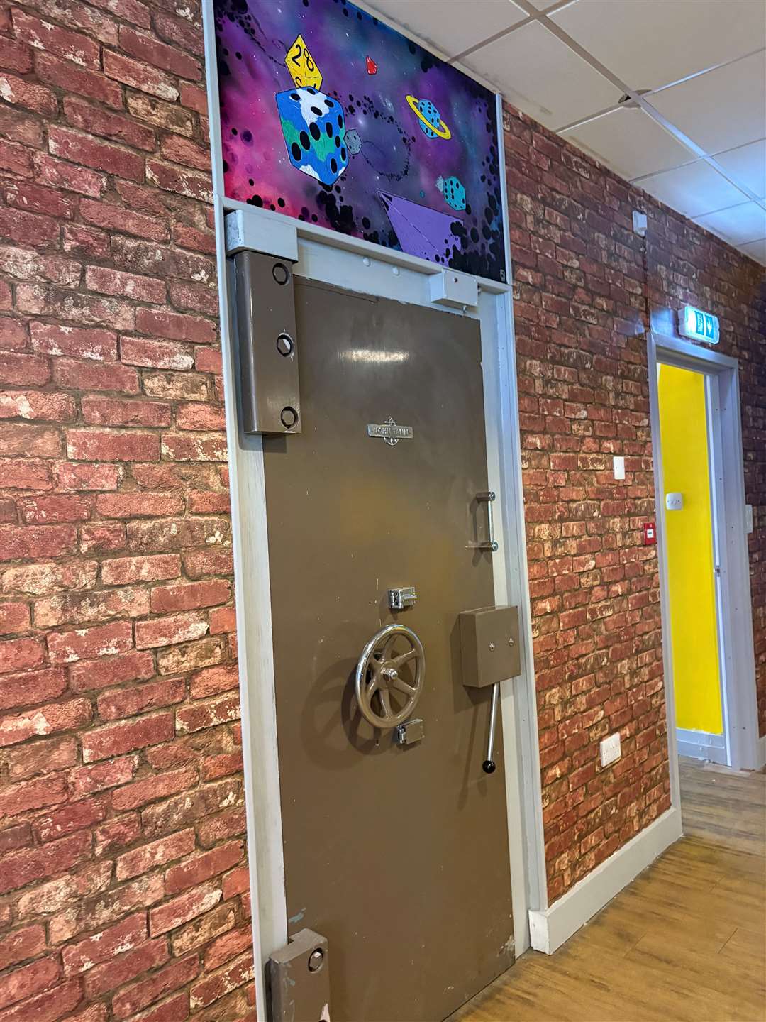 Seating inside a vault is available to play a board game of your choosing, with artwork done by Robin Twiddy above