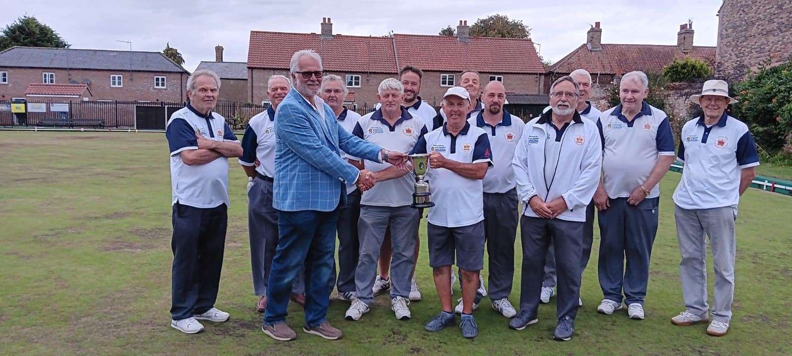 Winners Castle Acre Bowls Club.
